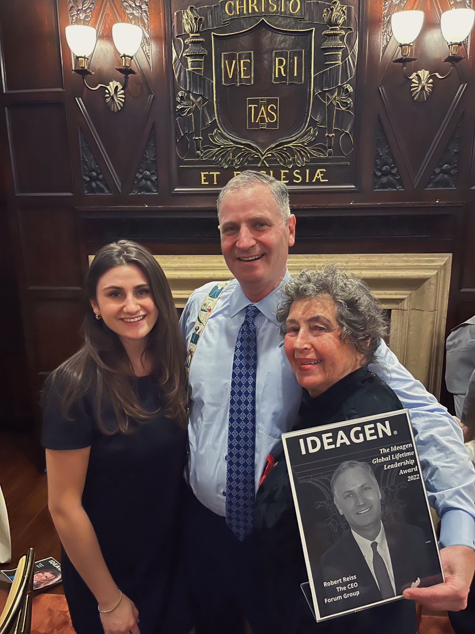 Robert Reiss, CEO of The CEO Forum Group, with daughter, mother, and award at the Harvard Club for Ideagen Global Lifetime Leadership Event